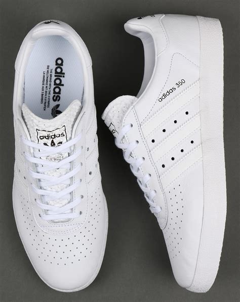 adidas all white leather sneakers.